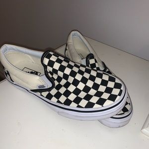 Black and white checkered slip on vans